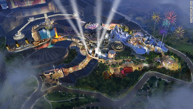 Looking down over a theme park overlay, from the sky. Pictured is a cruise liner ship, snowy capped mountain facades and well lit walking areas surrounded by green trees and shrubbery. There are 4 skylights beaming upwards towards the center of the park, with a set of fireworks exploding to the northeast of the park pictured.